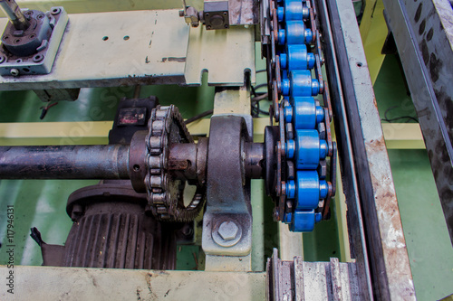 Motor drive shaft and transmission chain, conveyor.