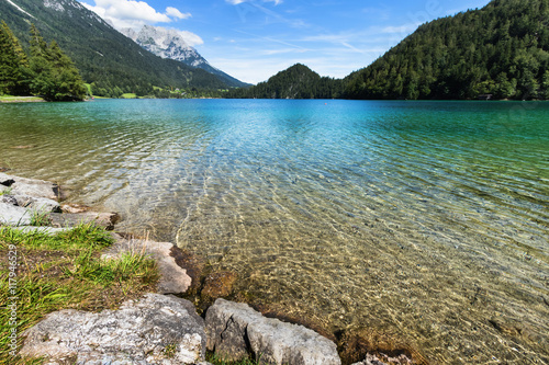 Fototapeta Naklejka Na Ścianę i Meble -  Clear water in a mountain lake. Hintersteiner Lake, Tyrol, Austria.