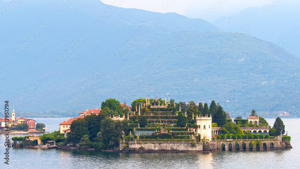 Palace and gardens in Isola Bella in Lake Maggiore. Italy, with Isola dei Pescatori in the background