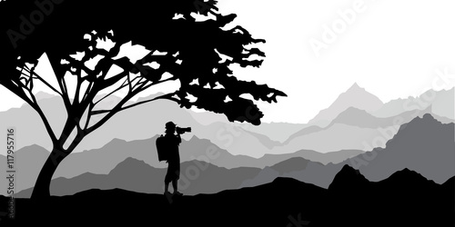 Photographer working in the mountains