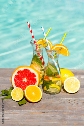 lemonade in jar with orange, grapefruit, lemon and mint