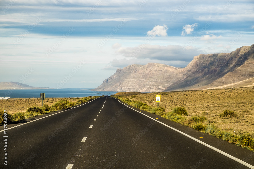 Road in the volcanic area of Lanzarote Road in the volcanic area of Lanzarote