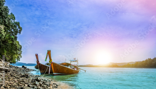 two boats on the sea with sunset light in evening at Krabi prov