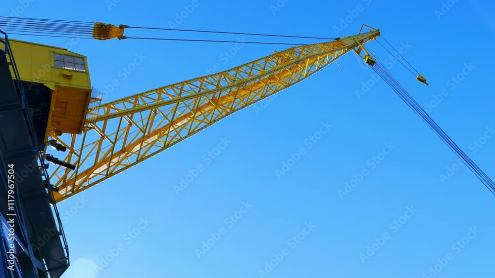 4K Yellow Crane with Cable, Blue Sky 4K Yellow Crane with Cable, Blue Sky