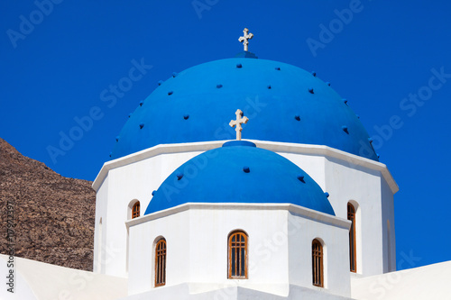 Blue domes of the Church of the holy cross in Perissa, Santorini. 