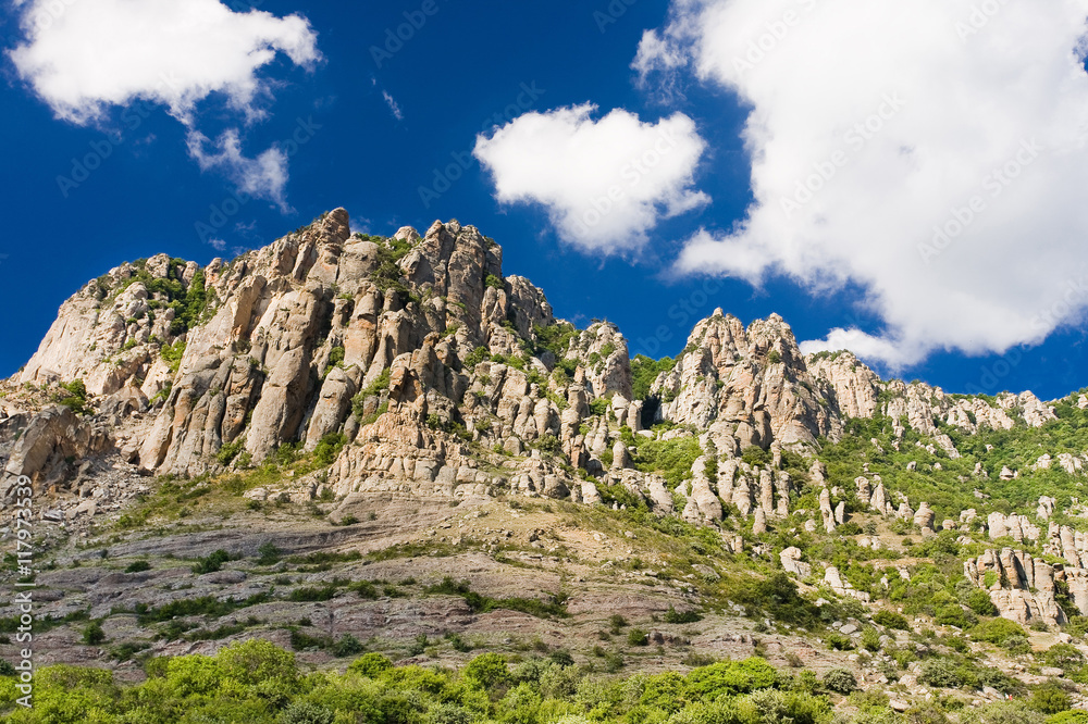 stone cliffs and blue sky in the Valley of ghosts in Crimea