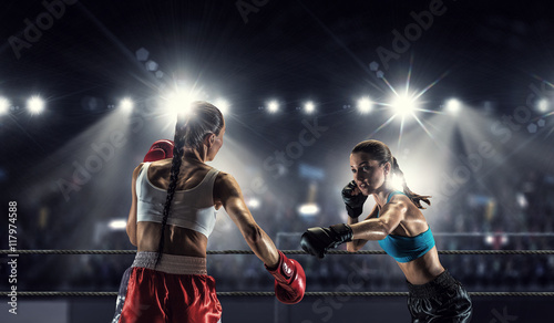 Girls boxing in ring . Mixed media © Sergey Nivens