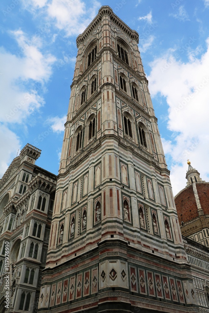 Upwards view to Giotto Campanile and Santa Maria del Fiore in Florence, Tuscany Italy 