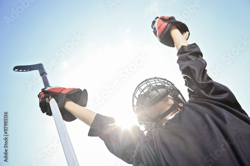 Photography A Portrait of hockey ball player with hockey stick