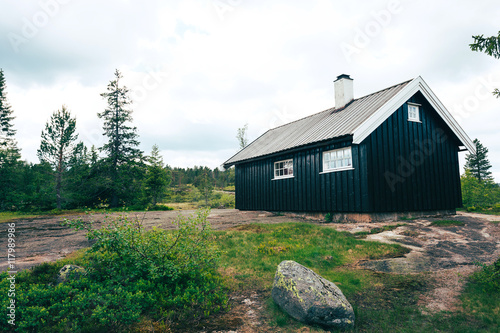 Cabin on a rocky hill in Norway