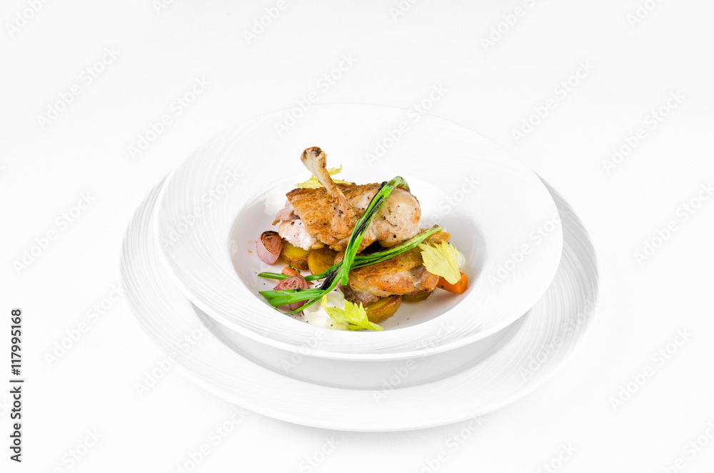 Chicken ham with crispy caramel crust and onions on a plate on a white background Chicken ham with crispy caramel crust and onions on a plate on a white background