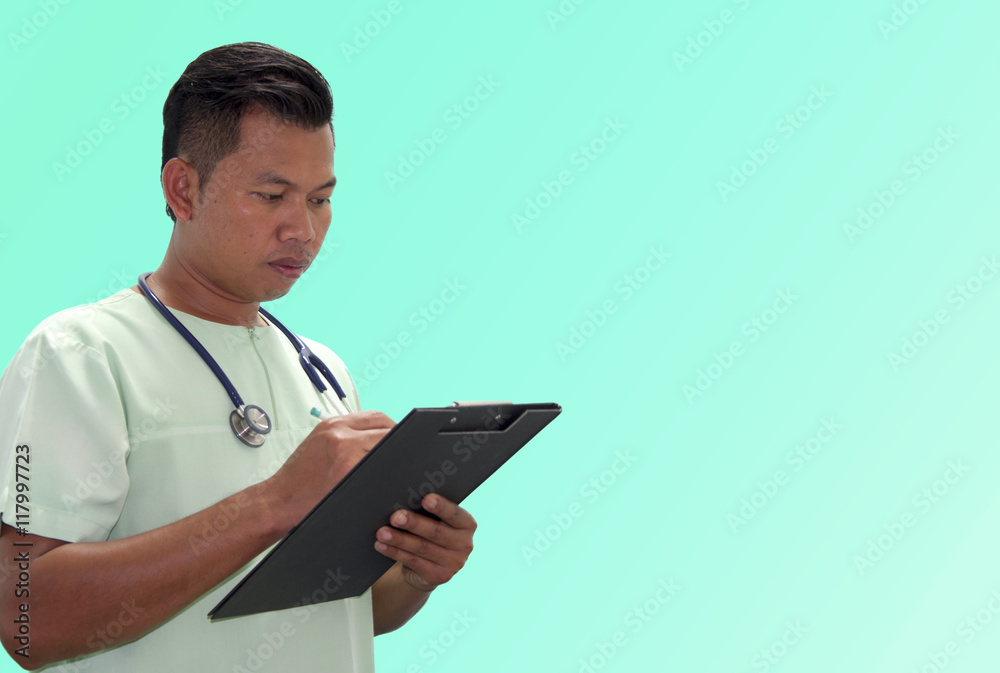 Doctor writing a medical prescription in hospital Doctor writing a medical prescription in hospital