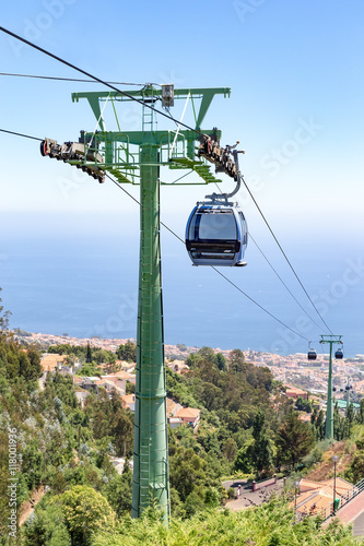 Cable car with cabins in landscape of Madeira