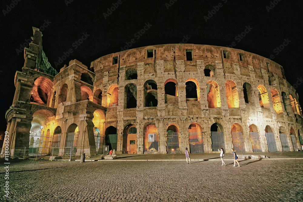 Colosseum in the city center in Rome Italy at dusk