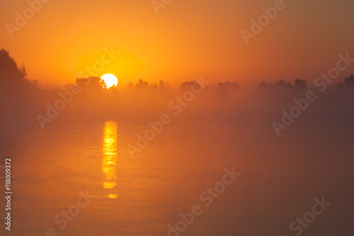 red sunset over river