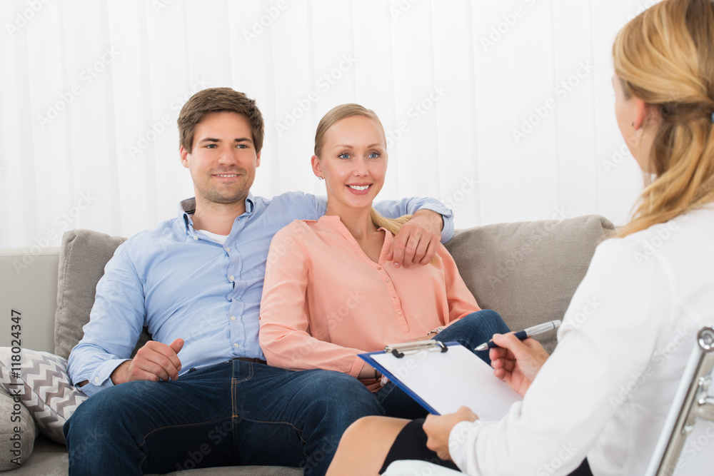 Obraz premium Young Couple Consulting With Psychologist