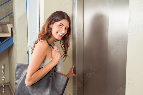 Woman Using Elevator