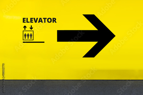 Sign With Elevator Icon and Arrow