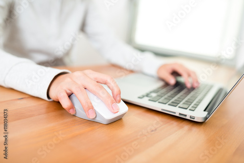 Woman working on laptop computer