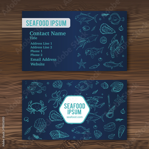 Business card template with hand drawn doodle seafood icons for restaurant. Vector illustration. Cartoon fresh sea food symbols: fish, crab, lobster, oyster, shrimp, shellfish on wood background.