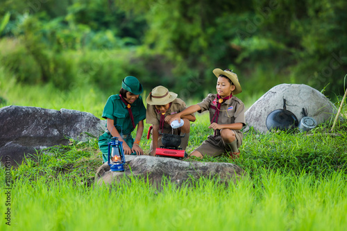 Boy Scout and girl scout in Camp to help themselves to the food as part of the study.