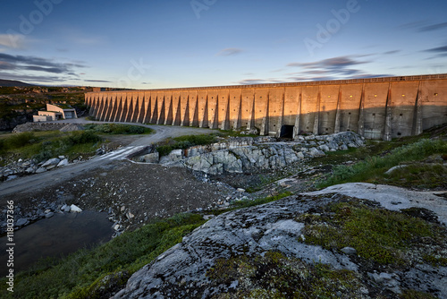 Huge dam in Norway, in the rays of the setting sun
