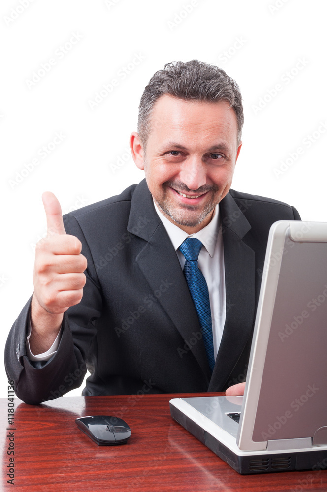 Portrait of smiling businessman with like gesture Portrait of smiling businessman with like gesture
