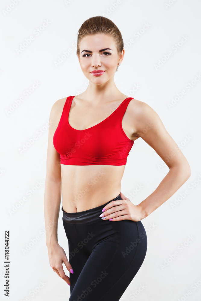 Sportive girl standing in gym Sportive girl standing in gym
