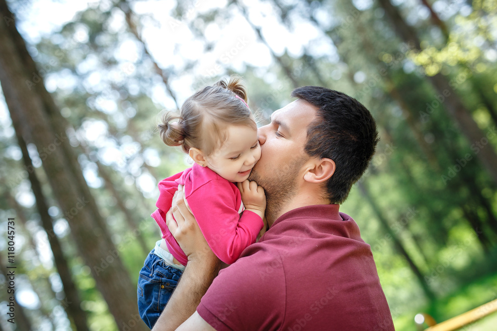 Fototapeta premium daddy playing with baby