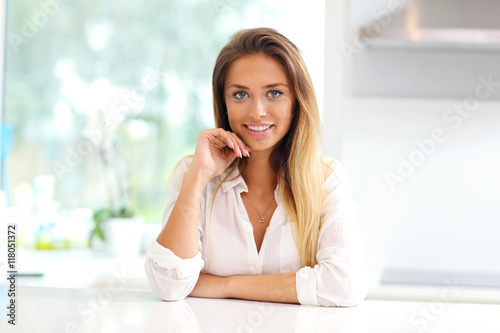 Free Download Young woman in kitchen - GFXLoad