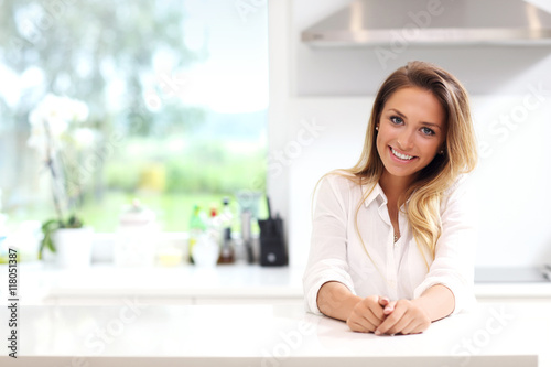 Young woman in kitchen