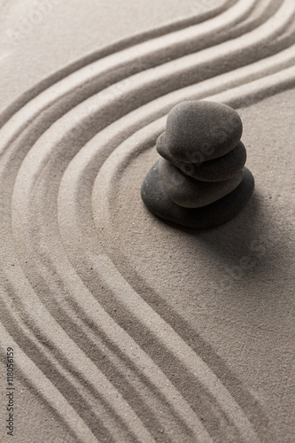 zen stone garden round stone and raked sand