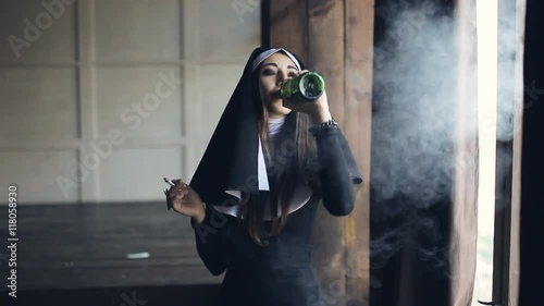 bad nun drinks alcohol and smokes