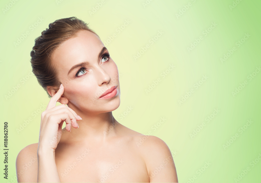 beautiful young woman touching her face beautiful young woman touching her face