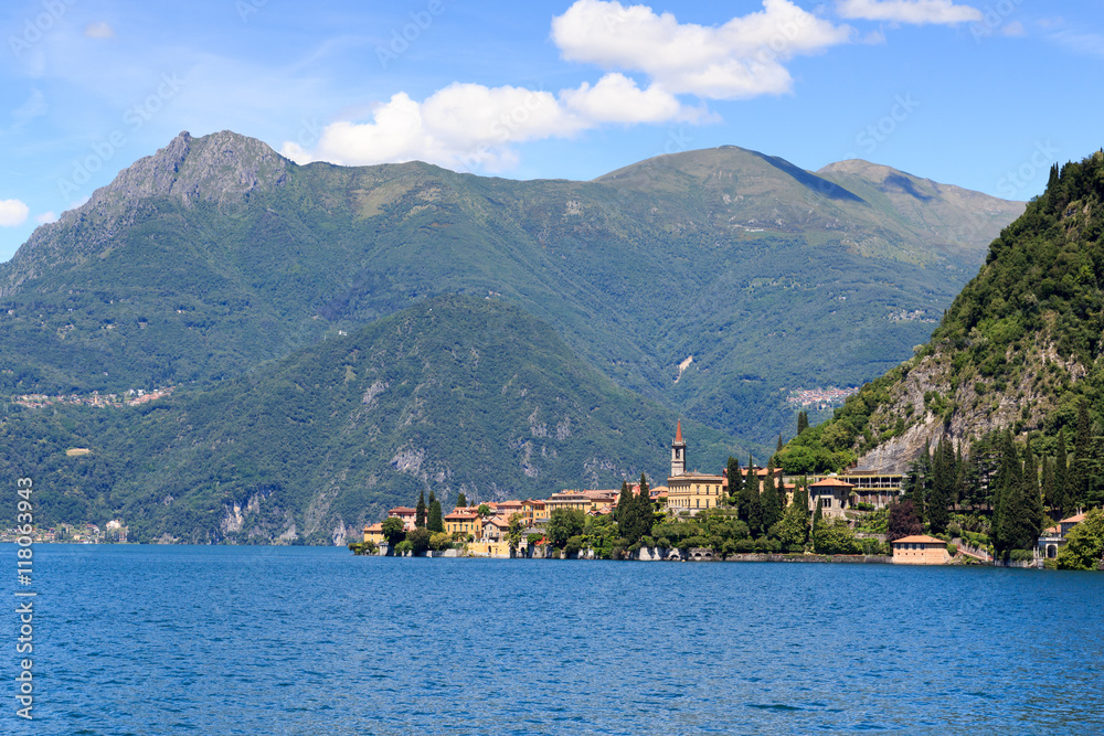 View towards lakeside village Varenna at Lake Como with mountains in Lombardy, Italy