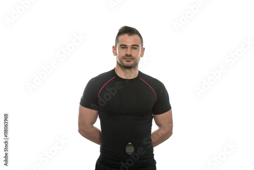 Muscular Man In Sports Outfit On White Background © Jale Ibrak
