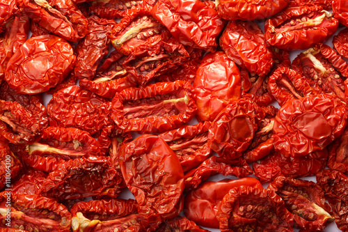 Dried tomatoes background, top view © maxsol7