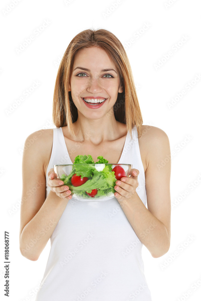 Woman holding a bowl of salad on white background Woman holding a bowl of salad on white background