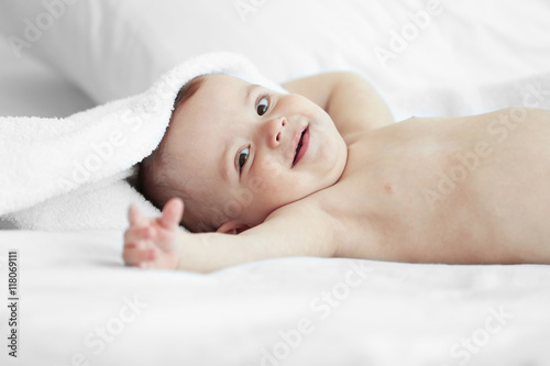 Cute baby lying on the bed