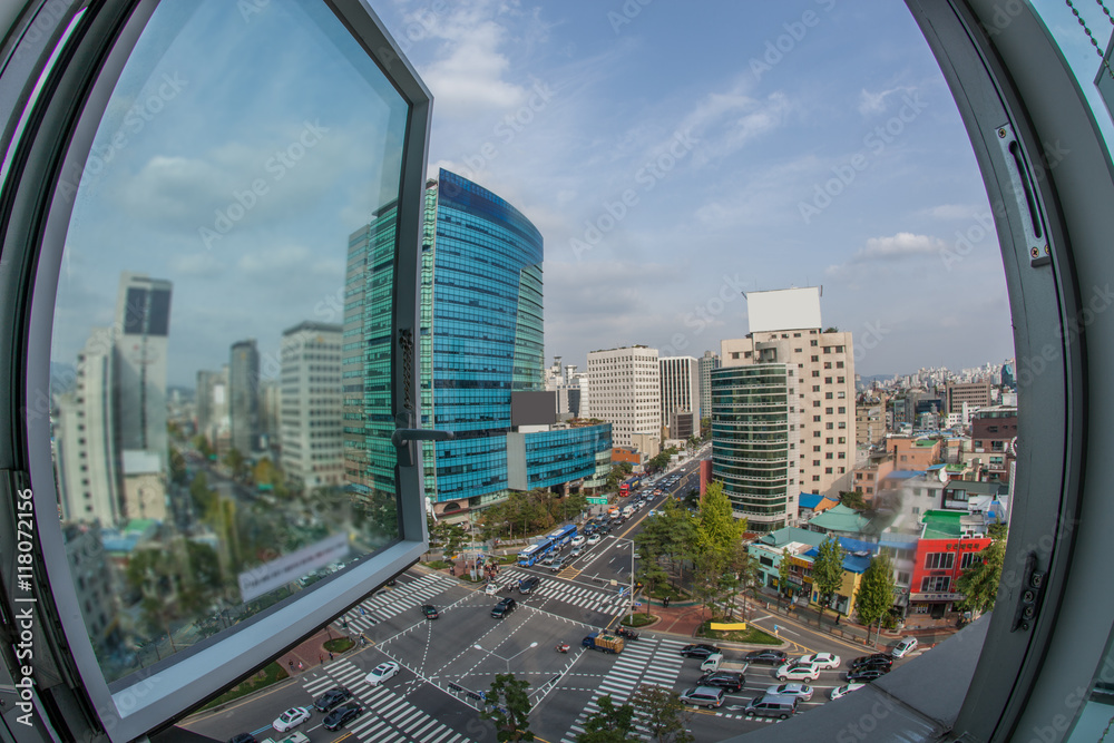 Obraz premium Wide angle shot of city panorama with intense car traffic on the streets. View from the window to Seoul, South Korea
