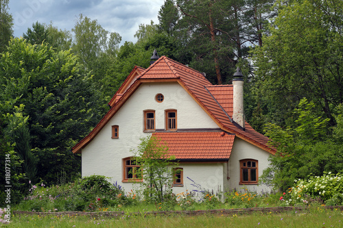 White vintage house in the forest