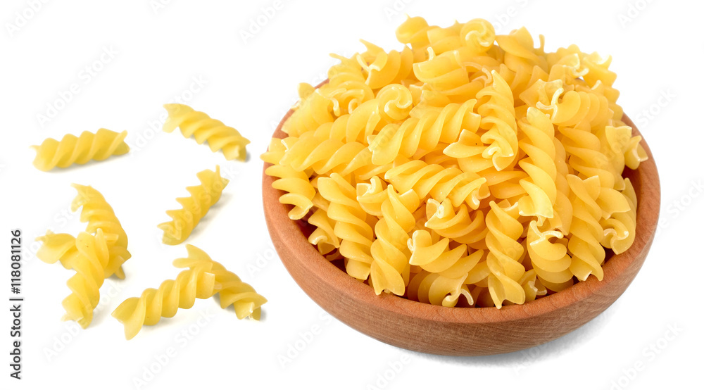fusilli pasta in the wooden plate fusilli pasta in the wooden plate