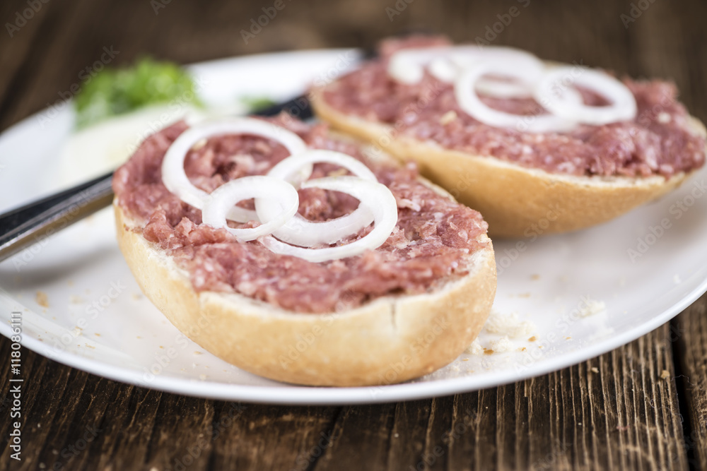 Bun with Mett (German cuisine; selective focus) Bun with Mett (German cuisine; selective focus)