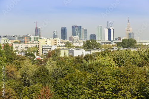 View of Warsaw - capital of Poland. City center with Palace of Culture and Science and green areas.