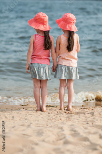 Beautiful twins near the sea