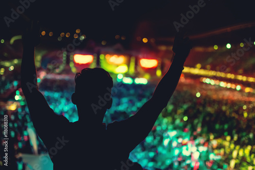 silhouette of man enjoying music concert, dancing silhouette