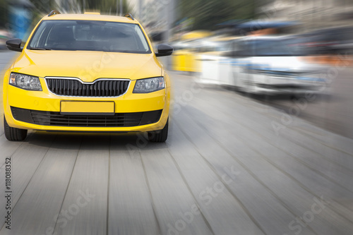 taxi moves on the city street