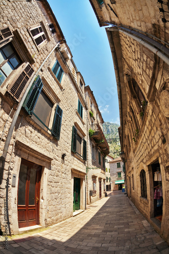 Fish-eye view of the old city on sky background