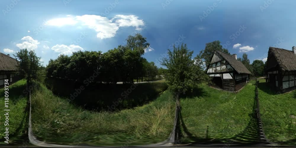 360Vr Video Tourist in Old Village White Houses With Cross Beams Courtyards Fenced With Palisade Rustic Landscape Ethnographic Museum Green Grass Sunny 360Vr Video Tourist in Old Village White Houses With Cross Beams Courtyards Fenced With Palisade Rustic Landscape Ethnographic Museum Green Grass Sunny