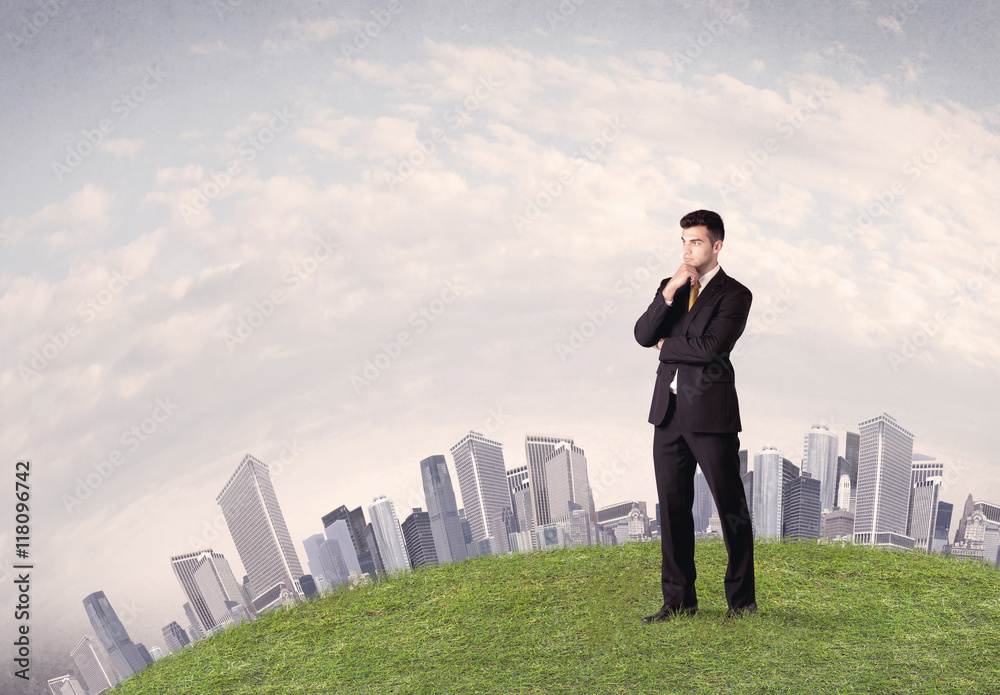 man standing in front of city landscape